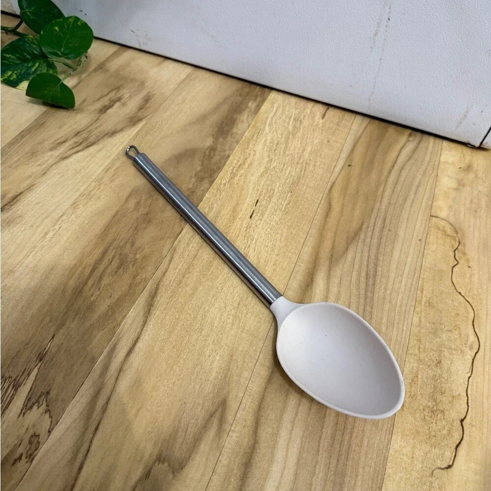 Elegant Silver and White Kitchen Spoon